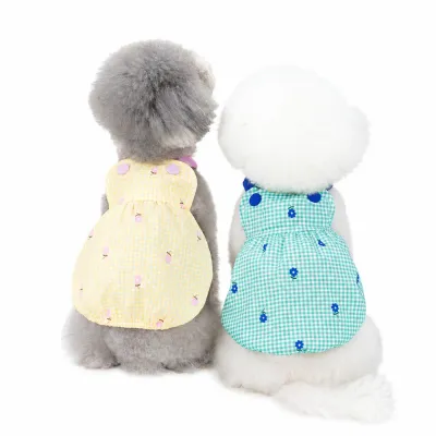 Back View of Cute Dog Suspender Dresses | Petfairs Rear view of small dogs wearing gingham suspender dresses in green and yellow