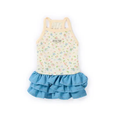 Yellow floral dog dress with layered blue denim ruffle skirt isolated on white background