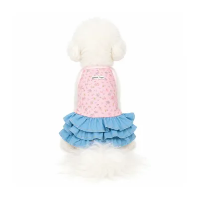 Small dog wearing pink floral denim ruffle dress for cats and small dogs