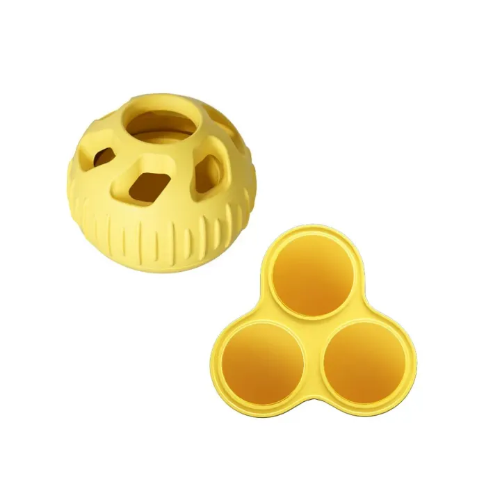 Yellow Silicone Treat Ball Dog Enrichment Toy Yellow silicone frozen treat dispensing dog toy with silicone snack mold for pets
