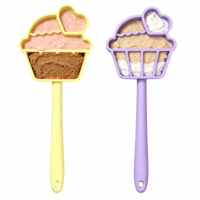 Silicone Dog Lick Spoon with Pet Yogurt & Wet Food Wholesale Yellow and purple silicone dog lick spoons filled with pet yogurt and wet food on white background for slow feeding and interactive licking