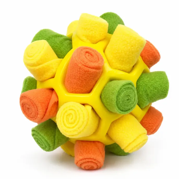 Yellow Dog Snuffle Ball Toy for Interactive Dog Training Yellow interactive dog snuffle ball toy with soft fleece pockets for treat dispensing and enrichment play