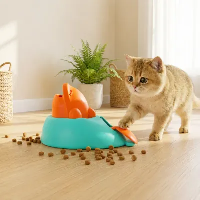 Cat Playing with Interactive Baby Whale Treat Launcher Toy Indoors Cute cat using baby whale interactive treat launcher toy on indoor wooden floor with scattered treats