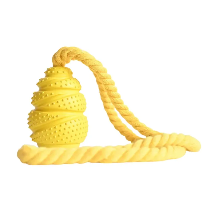 Yellow Interactive Rubber Dog Treat Toy Yellow rubber rope dog toy with textured surface for dental cleaning and chewing