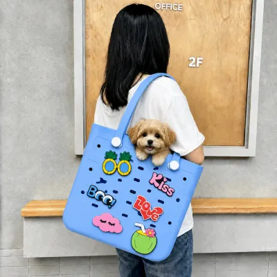 Blue EVA Pet Tote Bag Carrying a Cute Kitten Outdoors Woman carrying a blue EVA pet tote bag with a kitten and colorful DIY charms