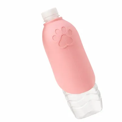Pink portable dog water bottle with paw print cover for outdoor pet hydration