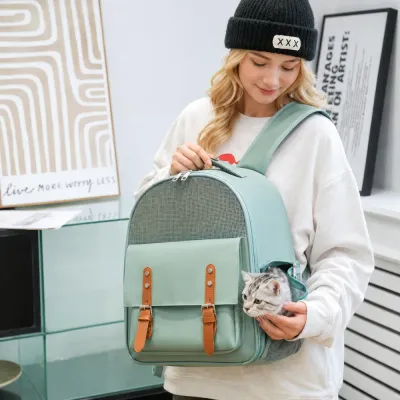 Woman Carrying Breathable Cat Backpack Carrier Female model using breathable cat backpack carrier with cat inside