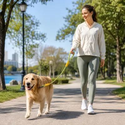 Outdoor Walking Scene with Reflective Dog Leash Woman walking golden retriever outdoors using reflective nylon rope dog leash