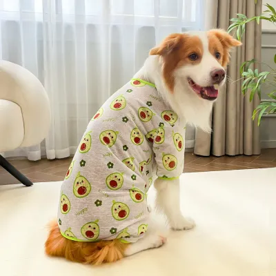 Avocado Print Full Body Dog Pajamas for Summer Border collie wearing avocado print lightweight dog pajamas in a modern living room