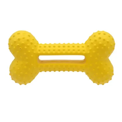 Yellow EVA bone dog chew toy for aggressive chewers with textured surface and bite-resistant design