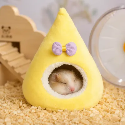 Sleeping Hamster Inside Warm Plush Nest Cute hamster sleeping inside a warm plush hamster house and hideout
