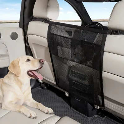 Dog Safety Barrier Net for Cars and SUVs Labrador sitting behind a mesh dog barrier net installed between vehicle front seats