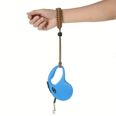 Adjustable paracord pet anti-loss wrist leash attached to retractable dog leash for secure dog walking