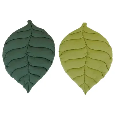 Reversible Leaf Cat Mat in Green Colors Reversible leaf shaped cat mat with light green and deep green sides for indoor cats