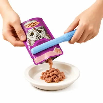 Cat Food Pouch Squeezer Tool for Wet Cat Food Feeding Hands using a cat food pouch squeezer tool to squeeze wet cat food from a pouch into a pet bowl with less waste.