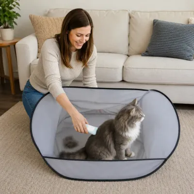 Cat Grooming Hair Catcher Apron for Shedding Control Woman brushing a cat inside a pet hair collecting apron to collect loose fur and simplify cleanup