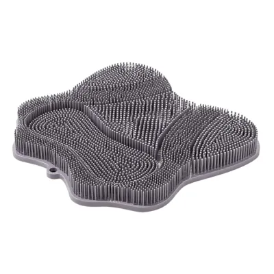 Grey cat self grooming massage brush mat with suction cup base and soft grooming bristles