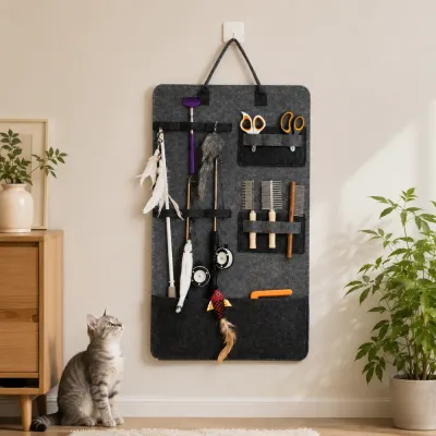 Hanging Cat Toy Organizer in Home Scene Hanging cat toy organizer mounted on wall with cat teaser sticks, toys and accessories neatly stored