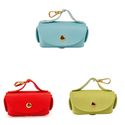 Dog Poop Bag Holder Collection Wholesale Pet Walking Accessory Set of dog poop bag holders in blue red and green with metal clips