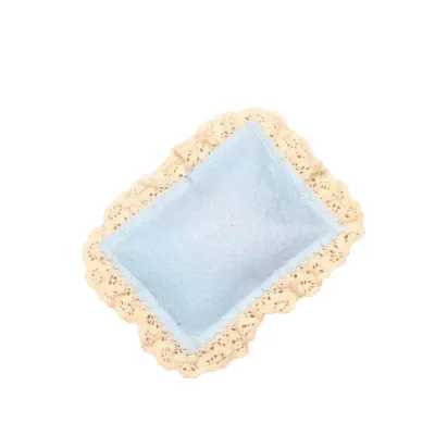 Blue Lace Catnip Pillow Toy on White Background Blue rectangular catnip pillow toy with lace edge on a clean white background