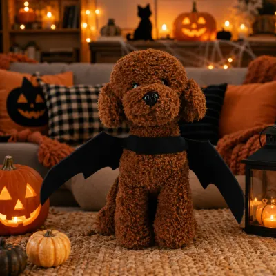 Dog Wearing Halloween Bat Wings Costume Small dog wearing black Halloween bat wings costume in cozy Halloween room decor