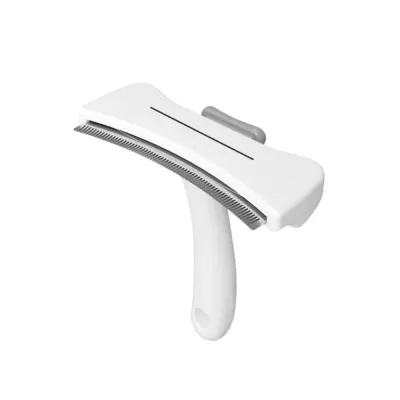 White one-click pet hair remover brush with curved comb teeth and ergonomic handle for cat and dog grooming.