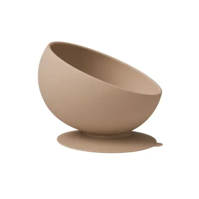 Brown silicone slow feeder dog bowl with suction base on white background