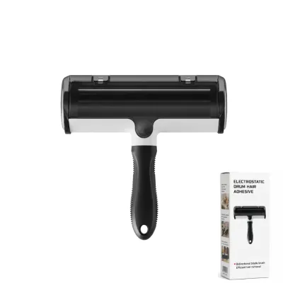 White and black electrostatic pet hair lint remover with handle and retail box on white background