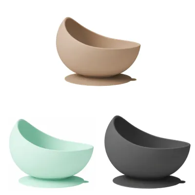 Silicone slow feeder dog bowl available in brown, green, and black colors with anti-slip suction base