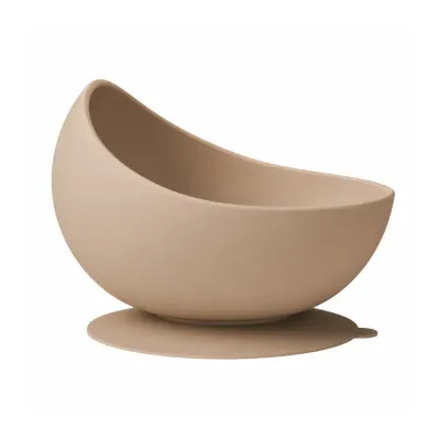 Brown silicone slow feeder dog bowl with wide suction base on a clean white background