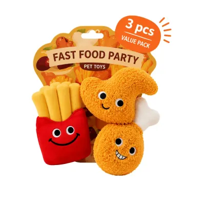 Packaged three-piece fast food plush dog toy set featuring fries and two chicken-shaped toys on a white background