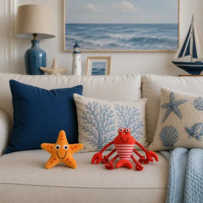 Lobster and starfish plush dog toys displayed on a coastal-style living room sofa