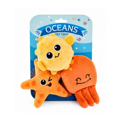 Close-up of packaged ocean animal plush dog toys featuring a pufferfish, starfish and octopus design