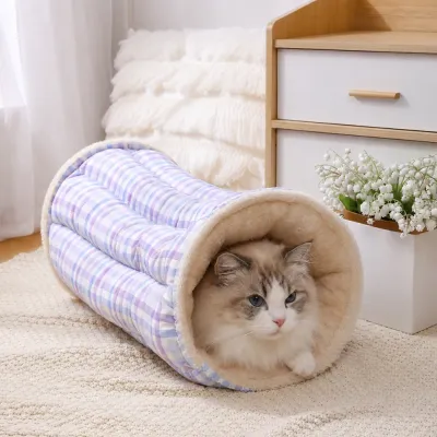 Purple plaid cat tunnel bed with fluffy lining for indoor cats resting at home