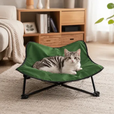 Cat relaxing on a green elevated pet bed with breathable fabric surface indoors