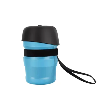 Blue Portable Dog Travel Water Cup with Wrist Strap Blue portable dog travel water cup in the closed position with a black cap and wrist carrying strap