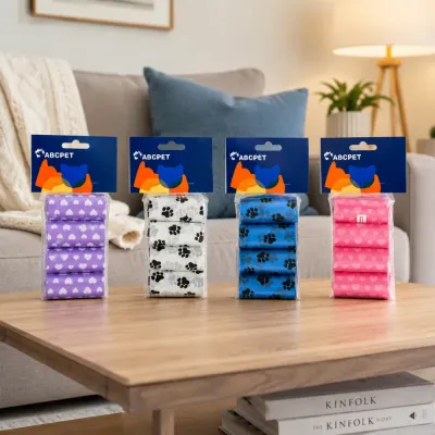 Wholesale Dog Poop Bags in Four Colors Four packs of wholesale dog poop bags in purple, white, blue and pink displayed on a living room table