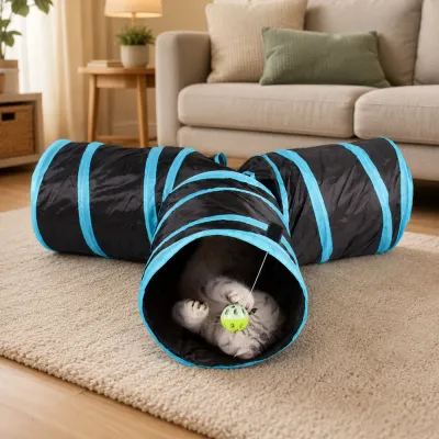 Interactive Cat Tunnel for Indoor Play Cat playing with a hanging ball inside a black and blue 3-way cat tunnel in a living room