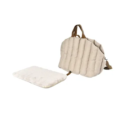 Beige padded car dog carrier with detachable soft liner displayed on a white background.