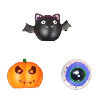 Halloween Bat Pumpkin and Eyeball Vinyl Dog Toy Set Halloween dog toy set with black bat orange pumpkin and white eyeball vinyl toys on white background