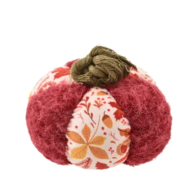 Fall pumpkin dog toy with red textured fabric, autumn leaf print and knotted rope stem
