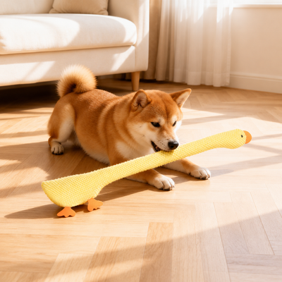 Interactive Long Neck Plush Dog Toy for Indoor Play Dog playing with a yellow long neck plush squeaky toy on the floor at home