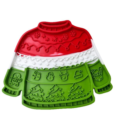 Front view of Christmas sweater dog slow feeder mat with raised silicone patterns and food sections