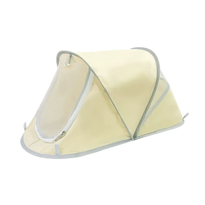 Cream portable pet tent with breathable mesh zippered front door on white background