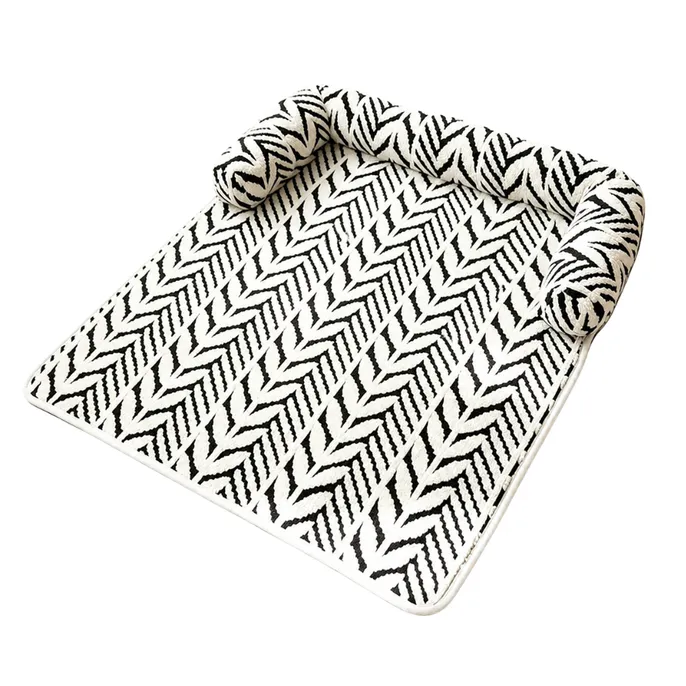 Black and White Striped Pet Sleeping Mat Black and white striped pet sleeping mat with raised plush bolster on white background