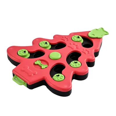 Red Christmas Dog Treat Puzzle Slow Feeder Red Christmas dog treat puzzle slow feeder shaped like a Christmas tree with multiple hidden food compartments