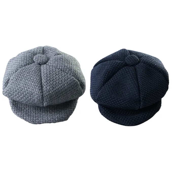 Grey and Navy Knitted Pet Beret Hats Grey and navy knitted pet newsboy caps for cats and dogs displayed on white background