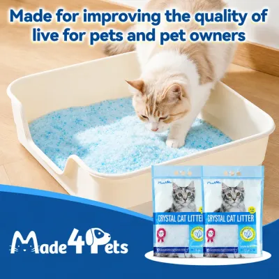 Healthy Crystal Cat Litter for Cats and Pet Owners white cat using crystal cat litter in a litter box with absorbent silica crystals