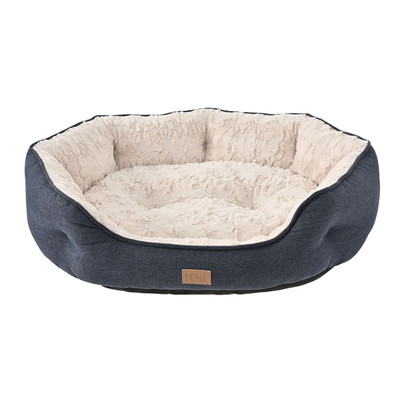 Cozy Navy Blue Plush Dog Bed Cozy navy blue plush dog bed with cream fluffy lining and raised cushioned sides