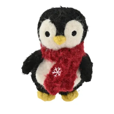 Close-up product image of a black and white penguin plush dog toy wearing a red Christmas scarf